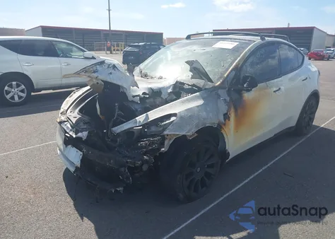 2021 Tesla Model Y Standard Range Rear-Wheel Drive from USA, damaged, VIN 5YJYGDEDXMF103483